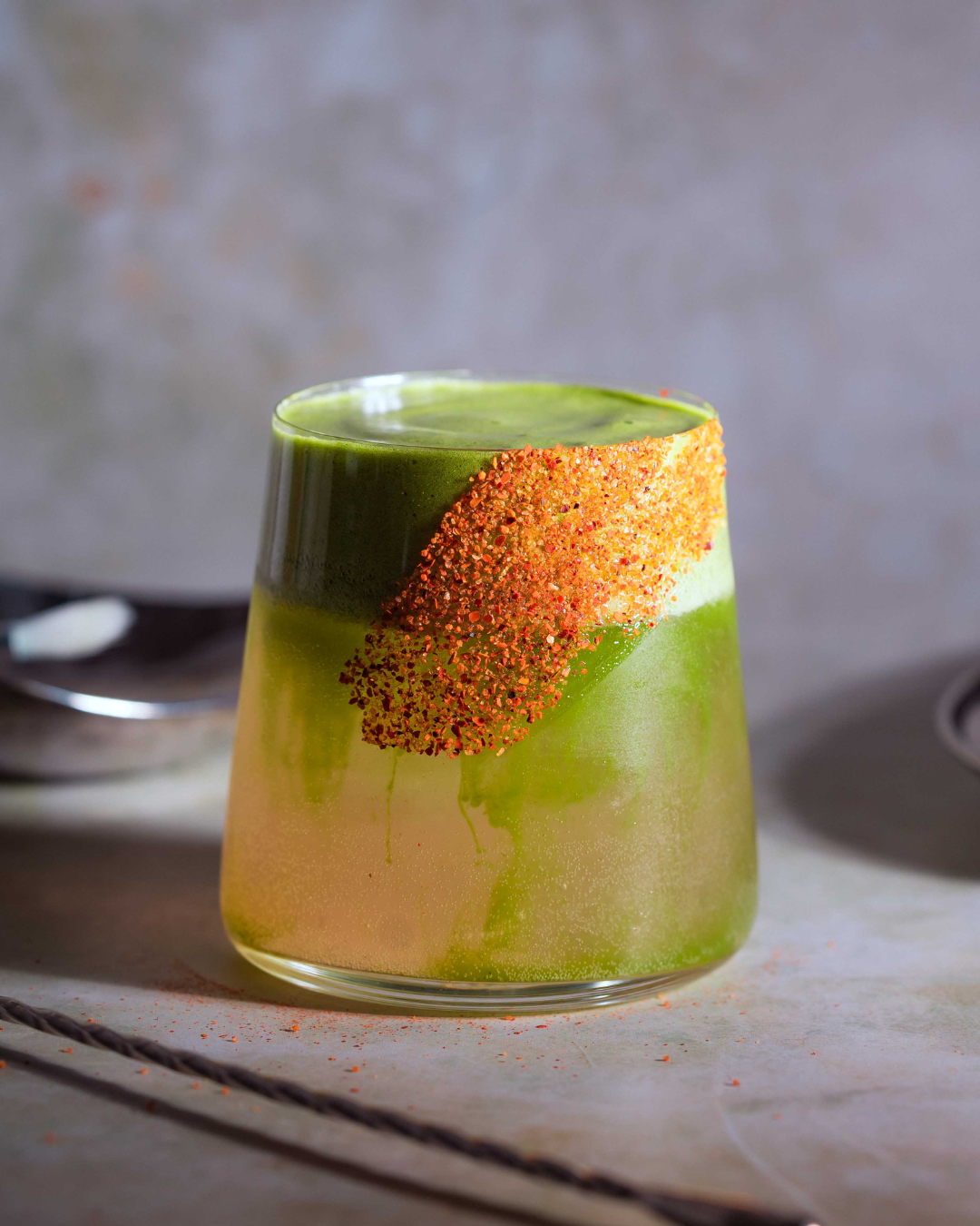 Cloud Nine matcha Paloma cocktail with silky matcha foam and a Tajín rim.